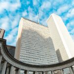 a group of tall buildings sitting next to each other