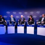 people sitting on stage