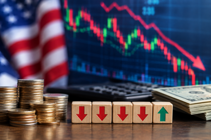 Photorealistic financial market scene showing falling stock charts, U.S. currency, stacked coins and market-direction indicators.